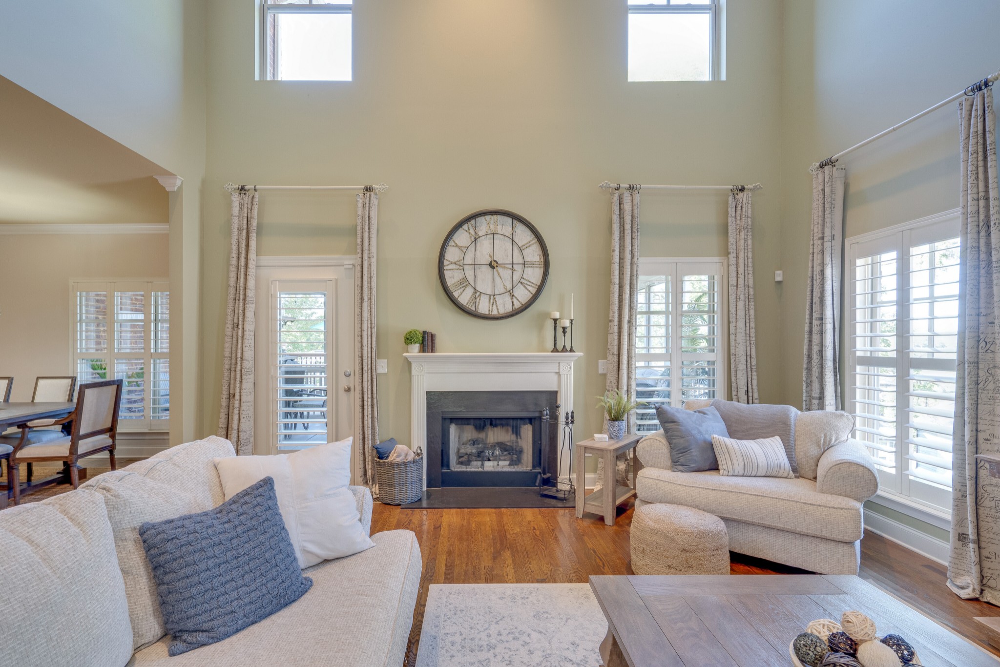 149 Keller Trail Franklin, TN 37064 - Photo 9 of 42 a living room with furniture a fireplace and a large window