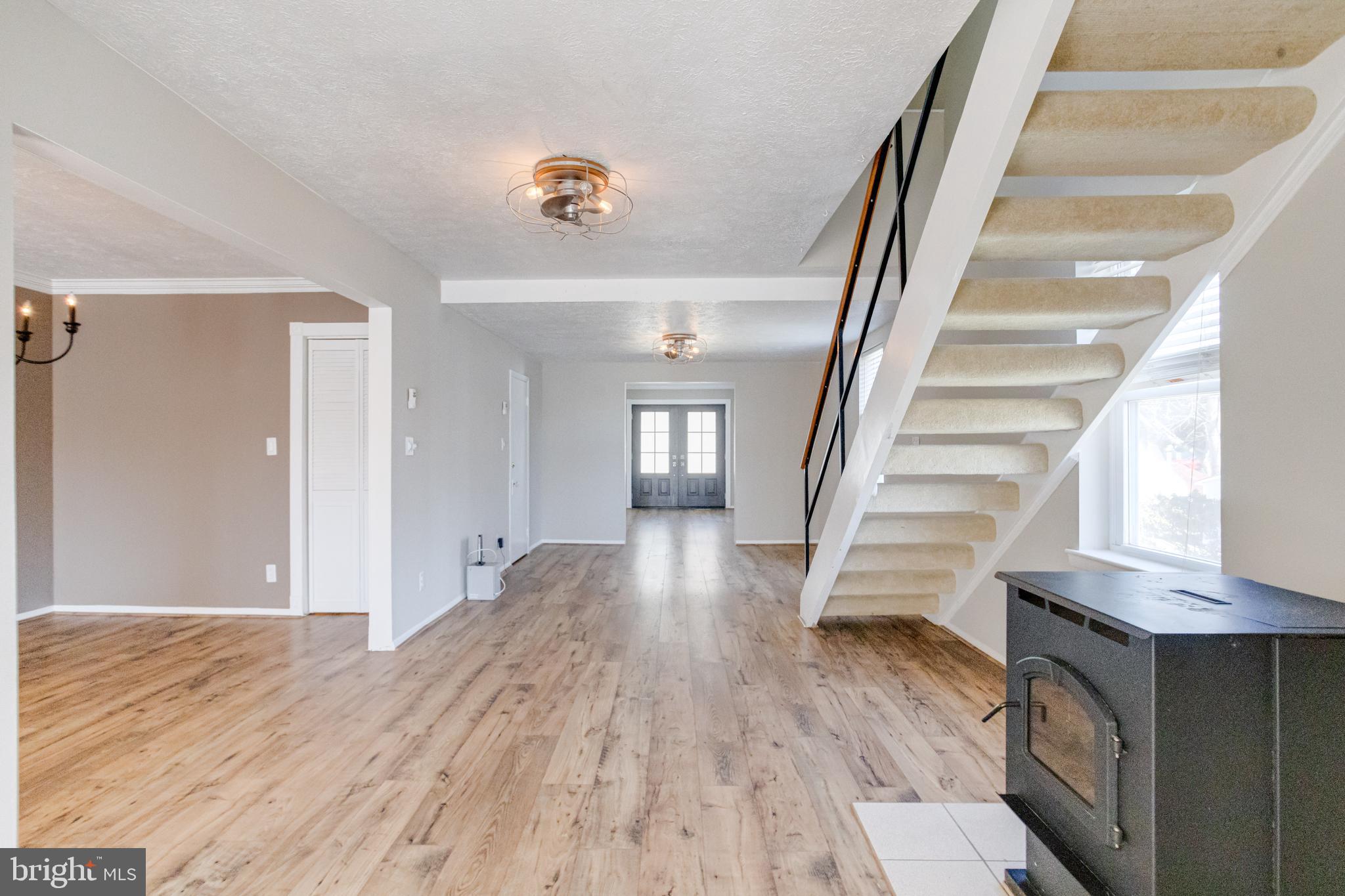 3809 Clarks Point Road Middle River, MD 21220 - Photo 13 of 49 a view of entryway and hall with wooden floor