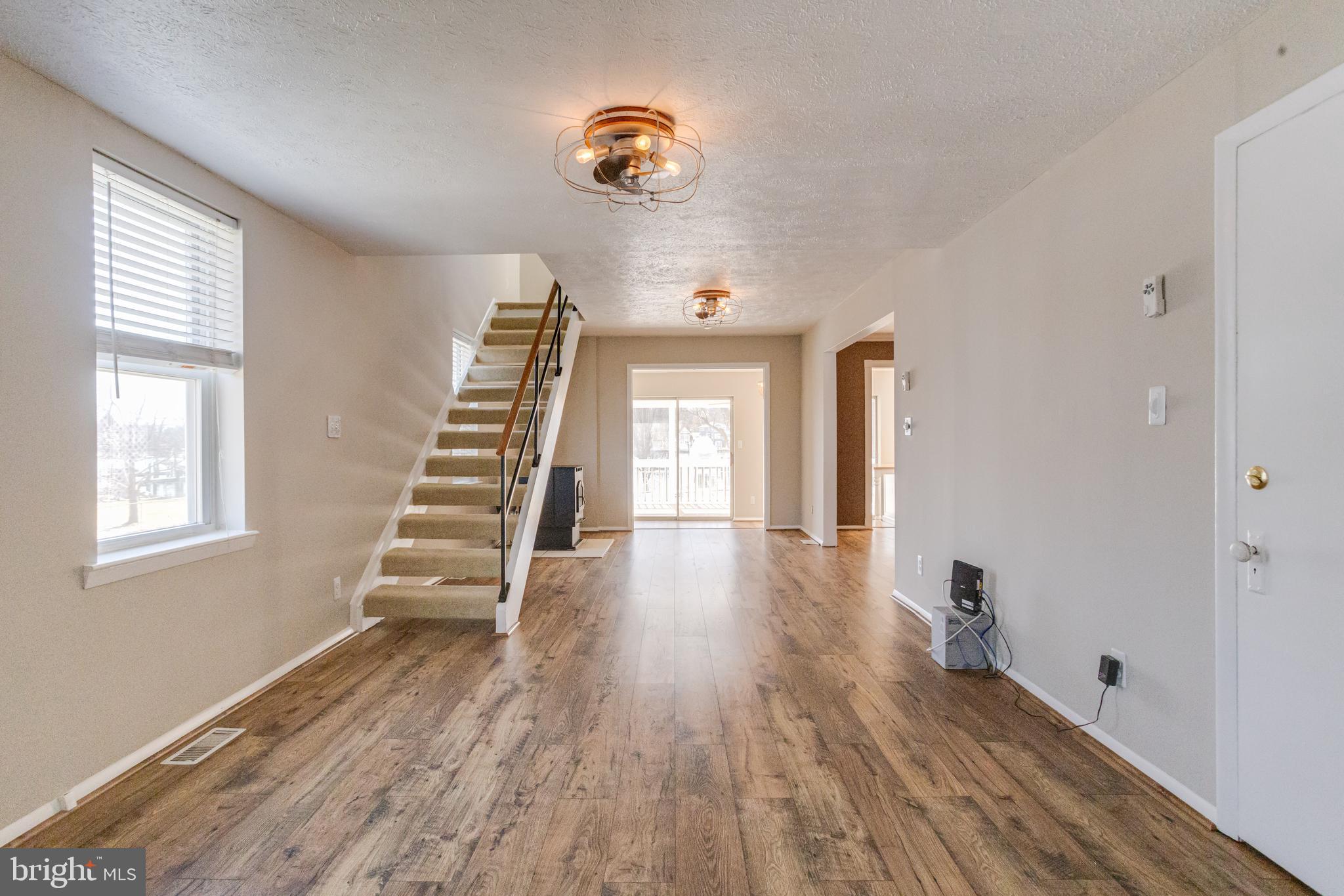 3809 Clarks Point Road Middle River, MD 21220 - Photo 16 of 49 a view of entryway with wooden floor