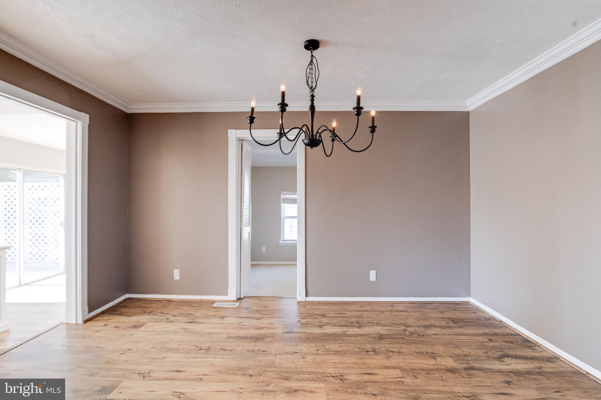 3809 Clarks Point Road Middle River, MD 21220 - Photo 18 of 49 a view of a livingroom with a staircase