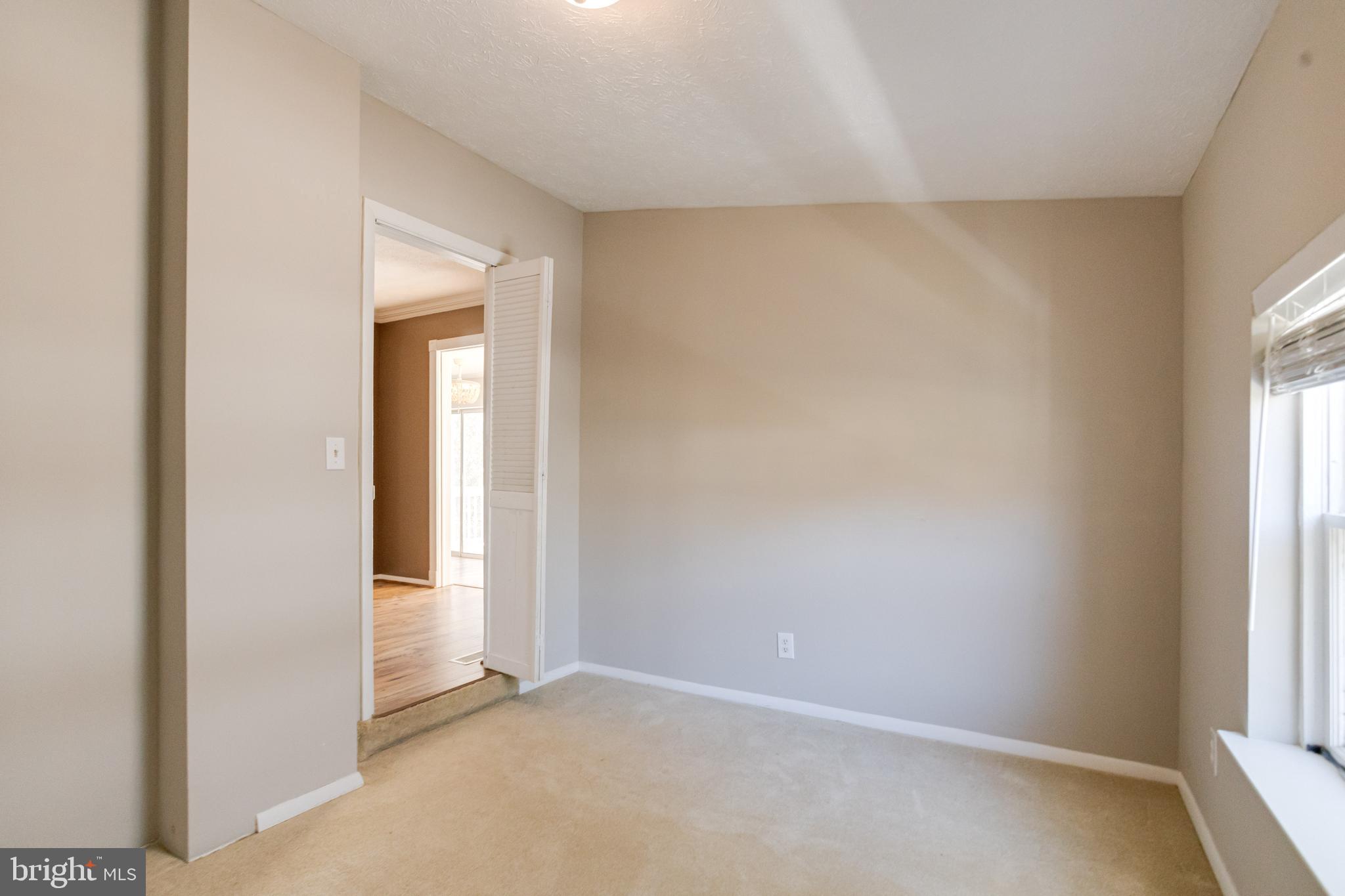 3809 Clarks Point Road Middle River, MD 21220 - Photo 20 of 49 an empty room with windows