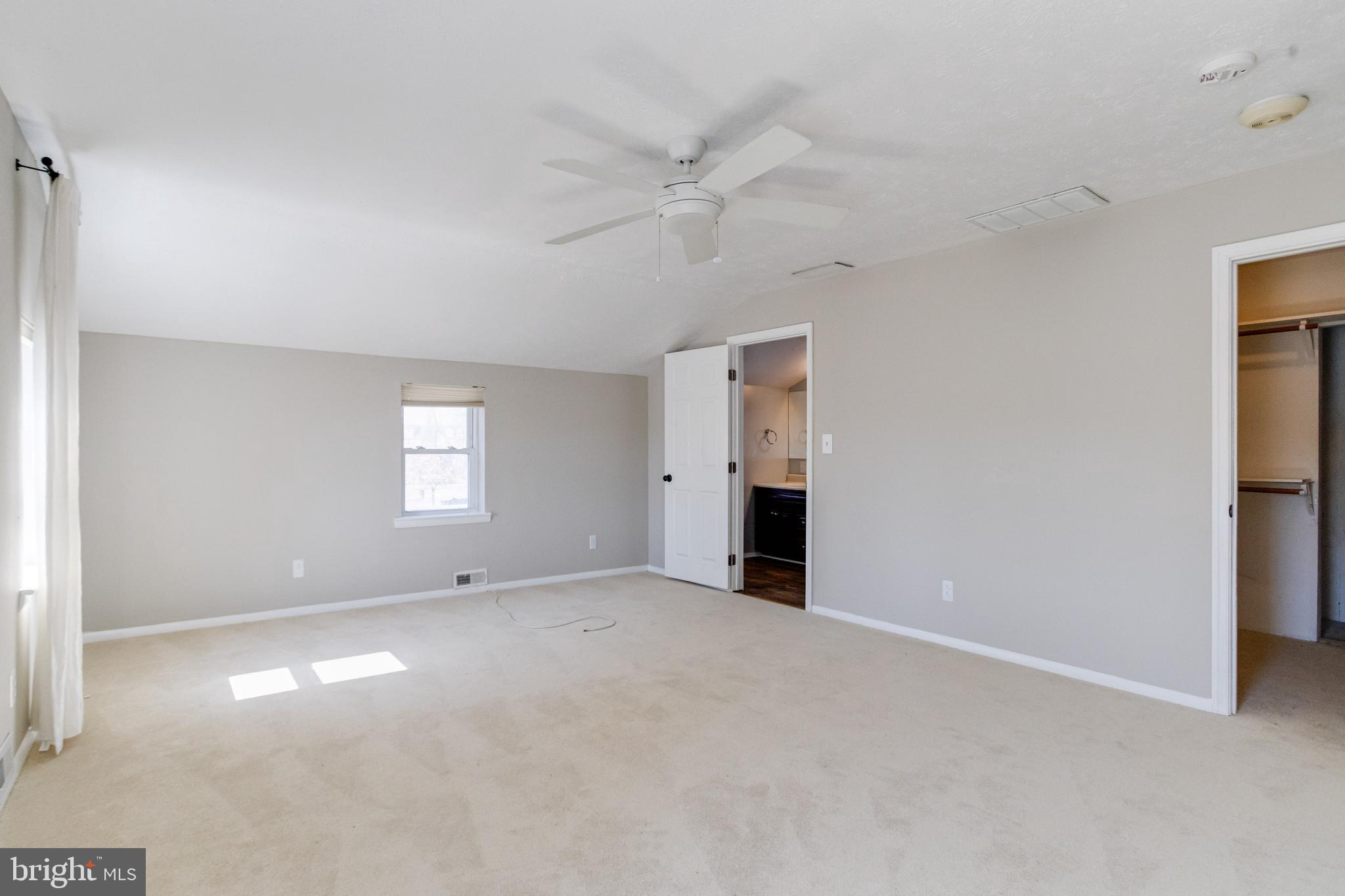 3809 Clarks Point Road Middle River, MD 21220 - Photo 10 of 49 an empty room with windows and closet