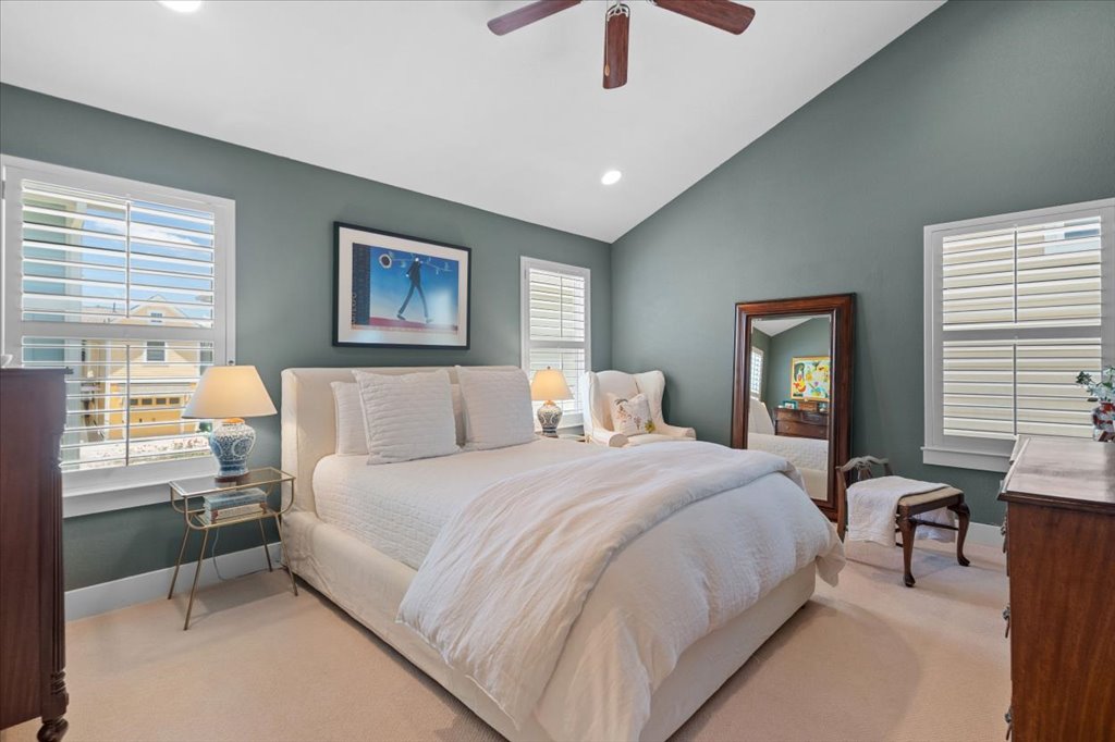 12200 Tawny Farms Road, Unit 139 Austin, TX 78748 - Photo 16 of 30 Now, welcome to your private primary retreat! The first thing you'll notice is that dramatic vaulted ceiling—it makes the room feel incredibly grand and spacious.