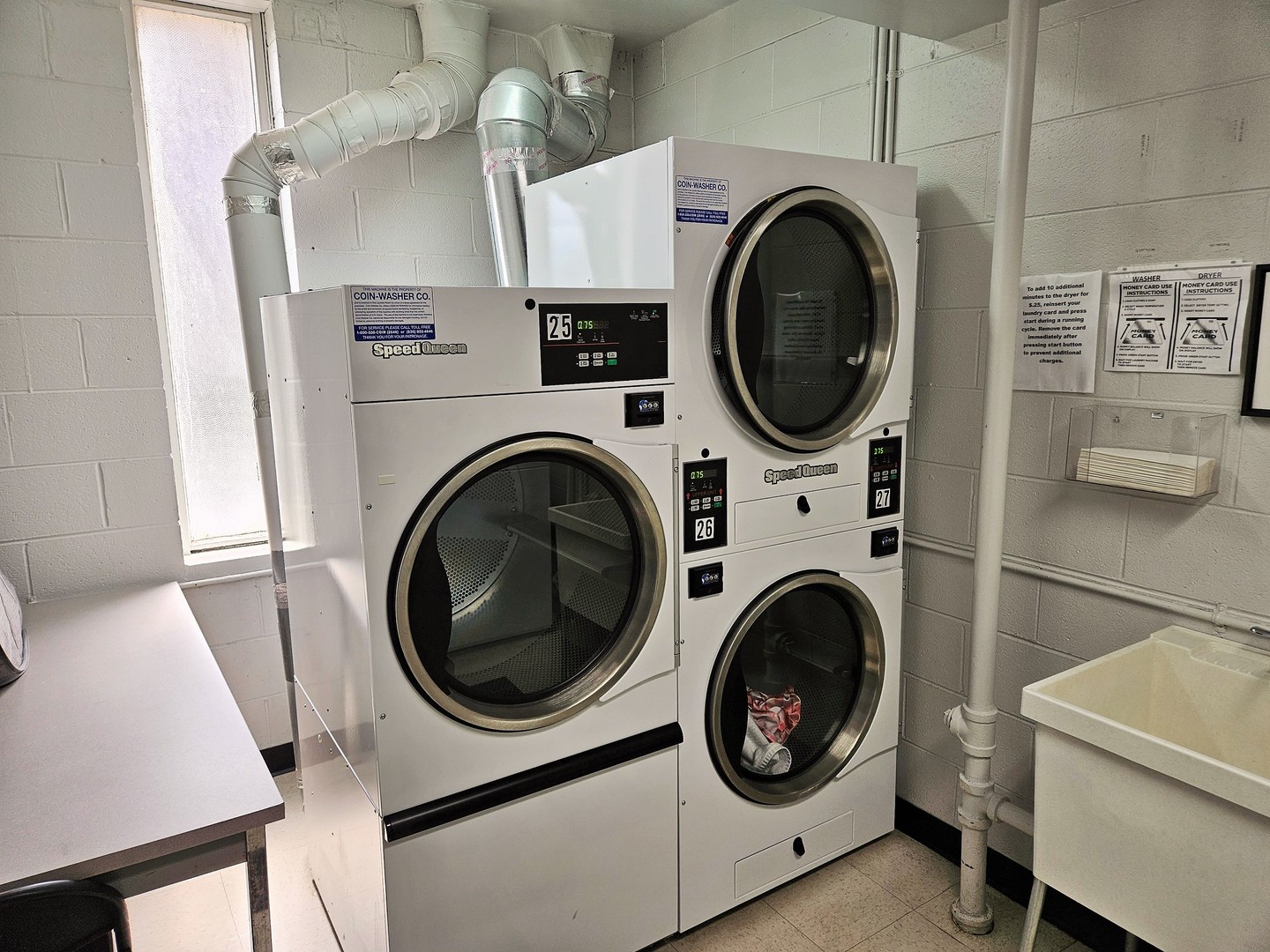 500 Thames Parkway, Unit 2K Park Ridge, IL 60068 - Photo 8 of 18 a utility room with dryer and washer