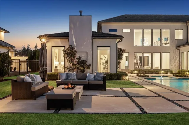 a view of a living room and floor to ceiling window