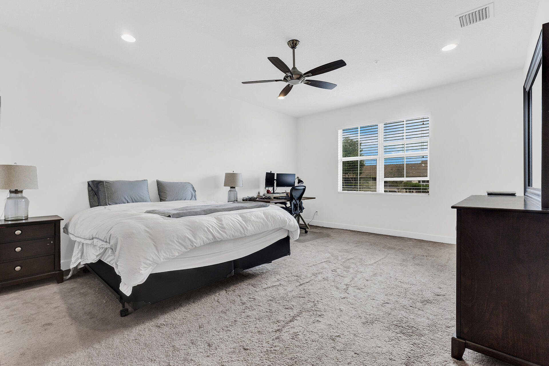 6640 Quiet Wave Trail, Unit 67 Boca Raton, FL 33433 - Photo 14 of 35 a bedroom with a bed and window