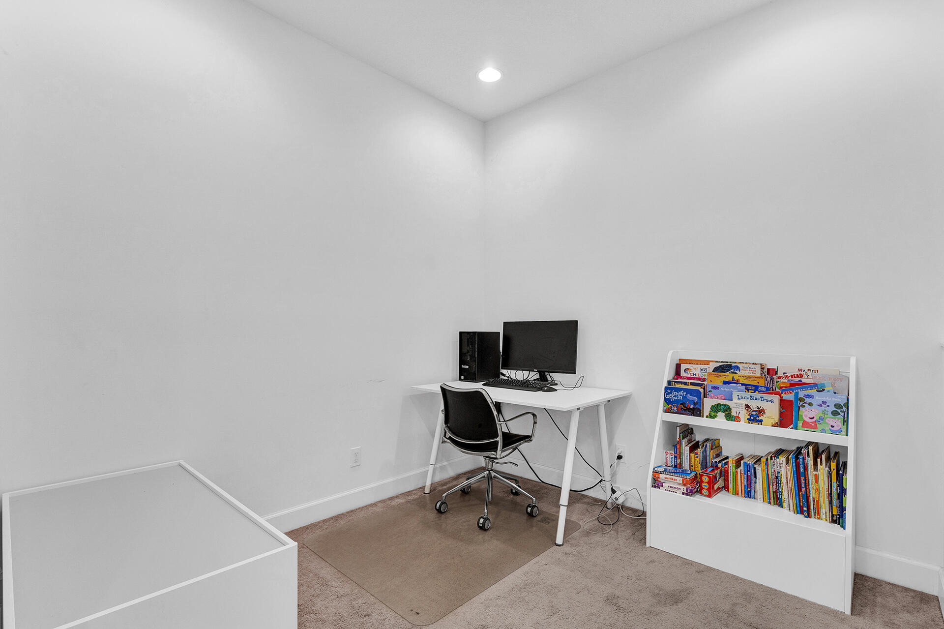 6640 Quiet Wave Trail, Unit 67 Boca Raton, FL 33433 - Photo 19 of 35 a workspace with a bookshelf