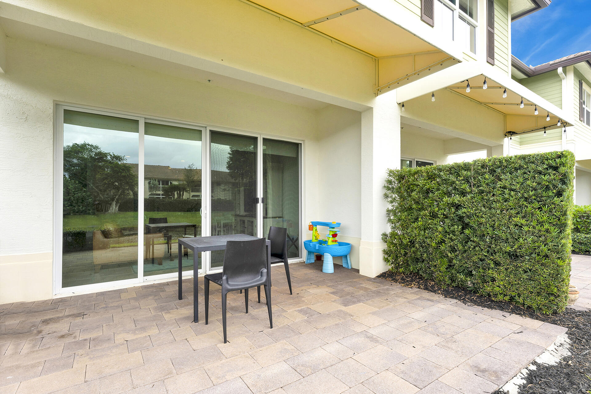 6640 Quiet Wave Trail, Unit 67 Boca Raton, FL 33433 - Photo 25 of 35 a house view with a sitting space and garden space