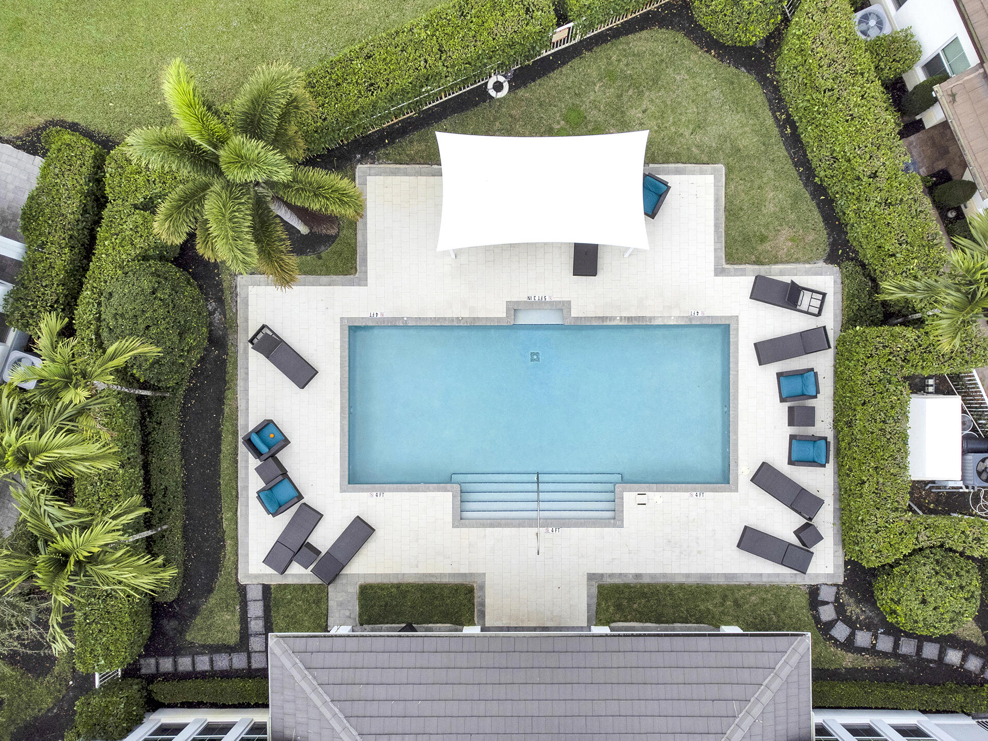 6640 Quiet Wave Trail, Unit 67 Boca Raton, FL 33433 - Photo 29 of 35 a front view of a house with garden