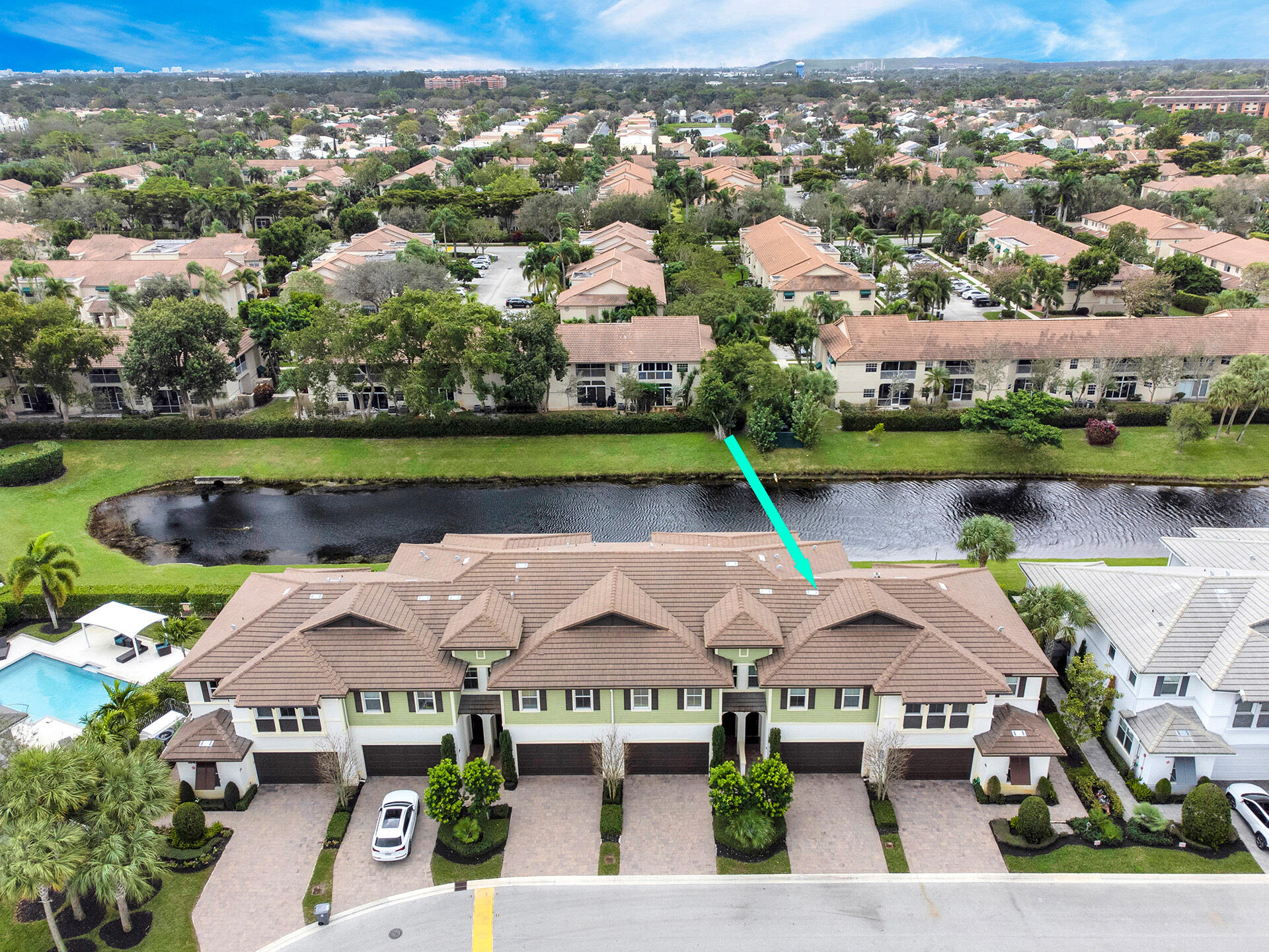6640 Quiet Wave Trail, Unit 67 Boca Raton, FL 33433 - Photo 3 of 35 an aerial view of a house with a lake view