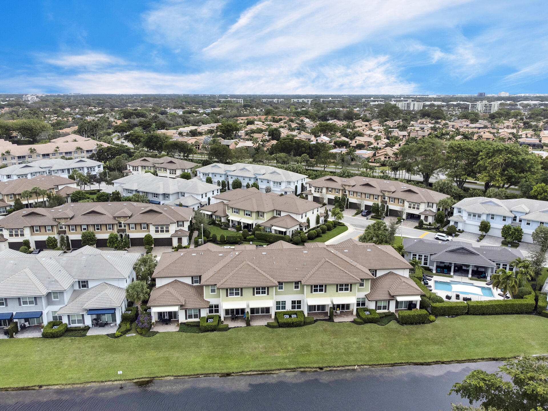 6640 Quiet Wave Trail, Unit 67 Boca Raton, FL 33433 - Photo 31 of 35 a view of multiple houses with yard