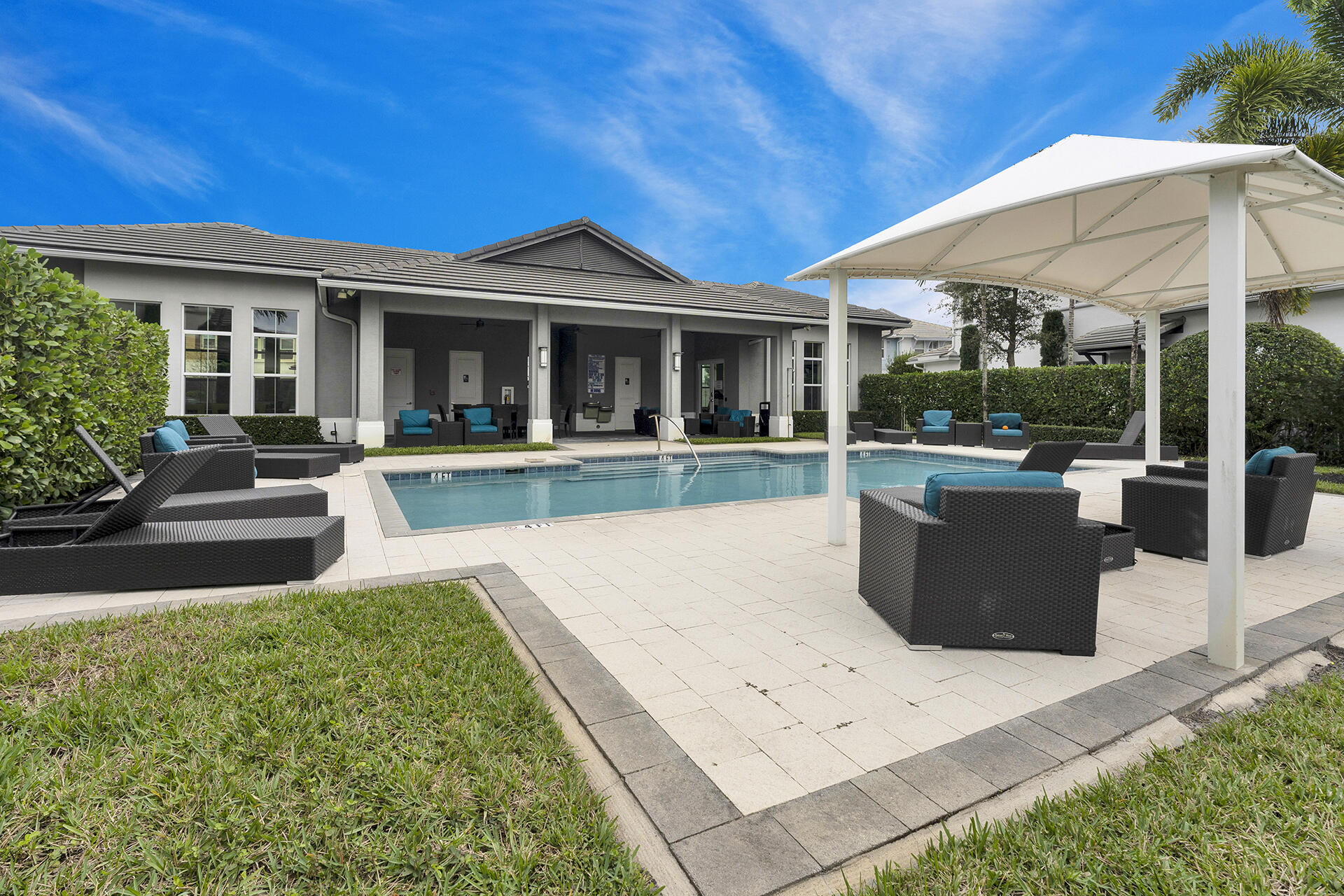 6640 Quiet Wave Trail, Unit 67 Boca Raton, FL 33433 - Photo 32 of 35 a view of a house with sitting area and garden