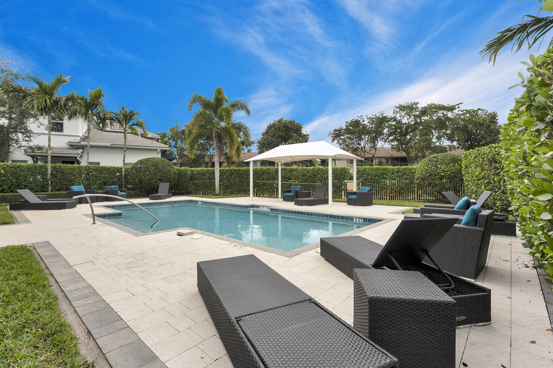 6640 Quiet Wave Trail, Unit 67 Boca Raton, FL 33433 - Photo 33 of 35 a view of swimming pool with lounge chair