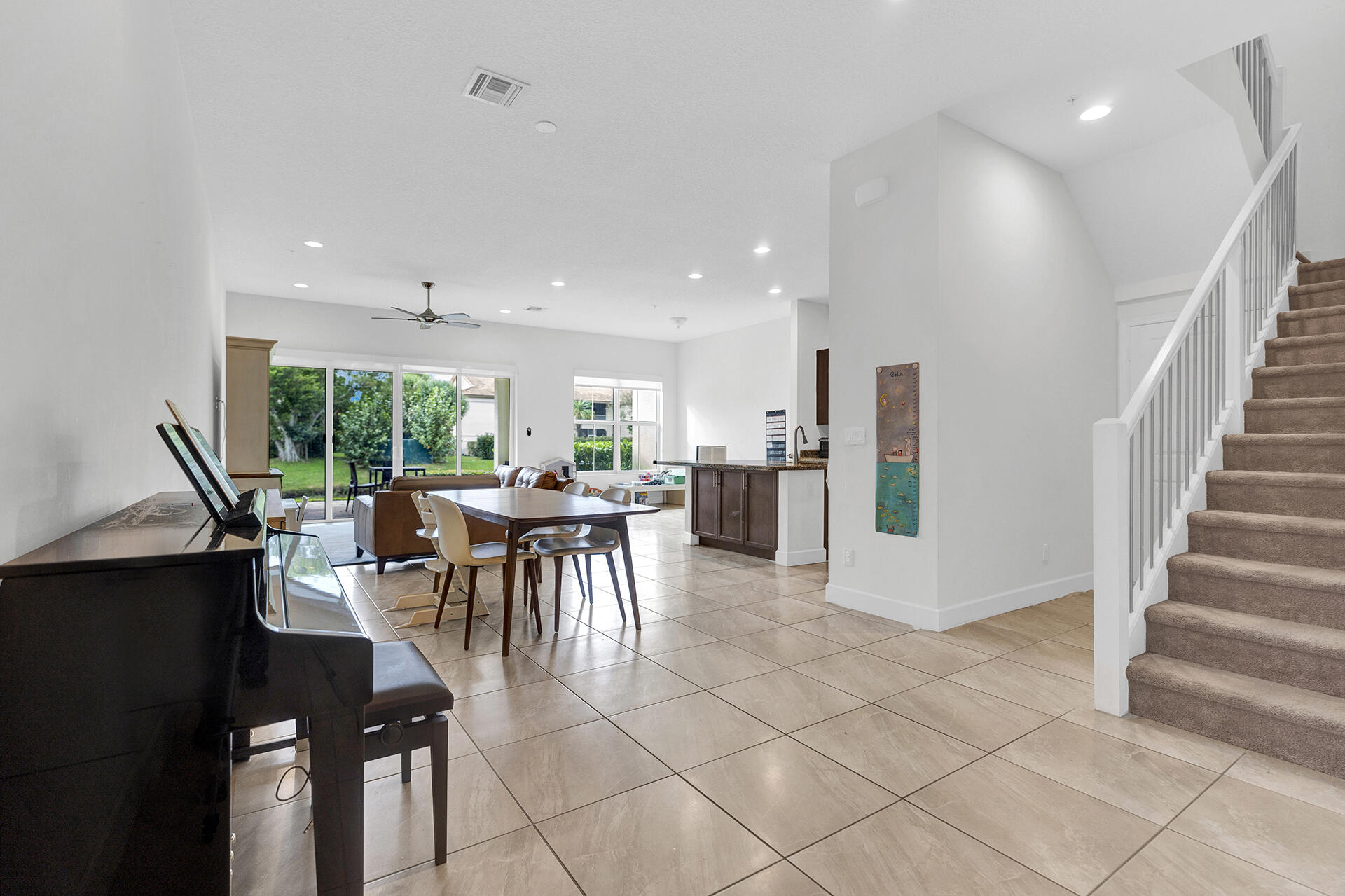 6640 Quiet Wave Trail, Unit 67 Boca Raton, FL 33433 - Photo 4 of 35 a view of a dining room with furniture