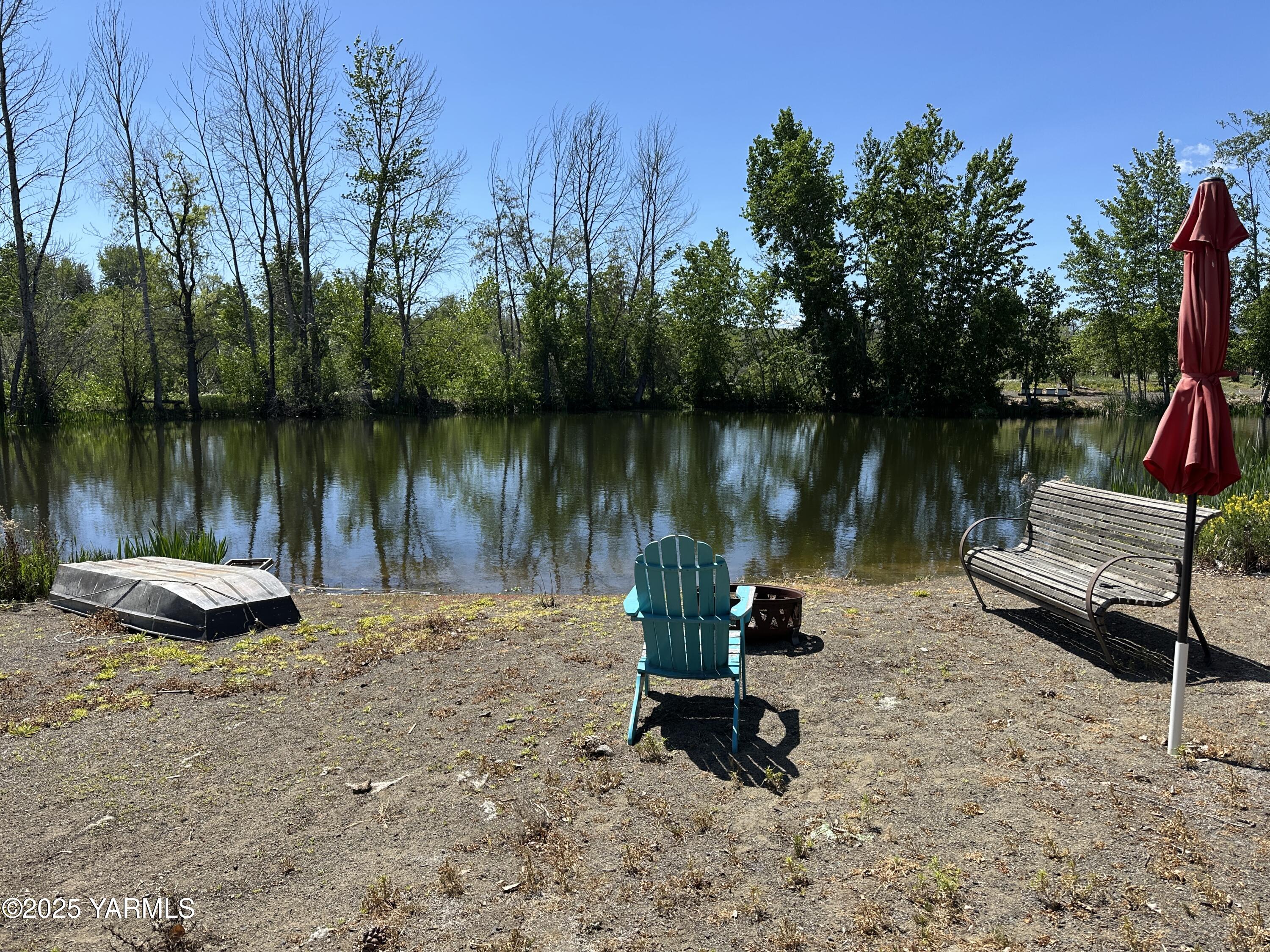 1465 Cook Road Yakima, WA 98908 - Photo 3 of 43 a body of water with a tree in the background