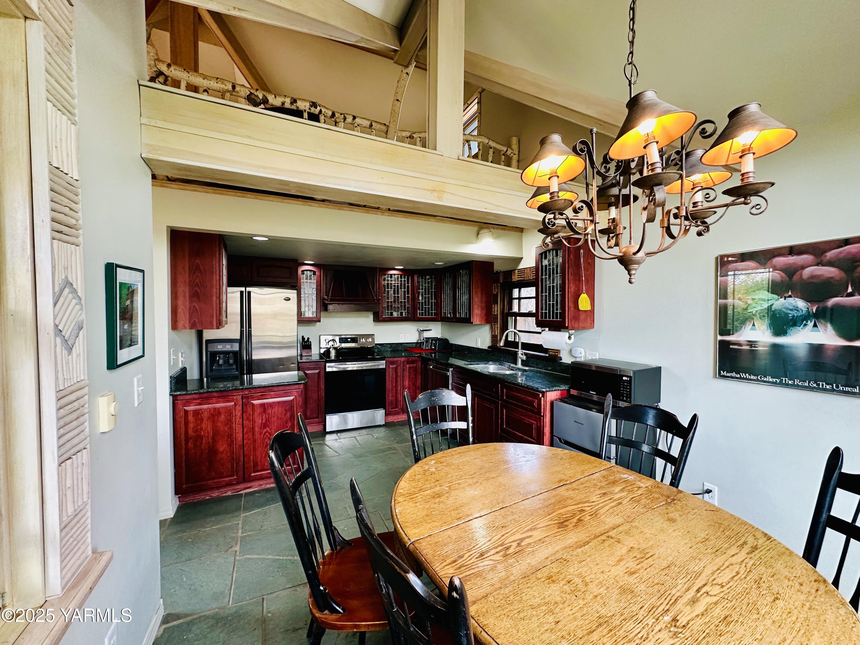 1465 Cook Road Yakima, WA 98908 - Photo 10 of 43 a view of a dining room with furniture