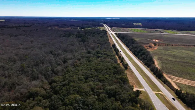 a view of balcony with wooden floor