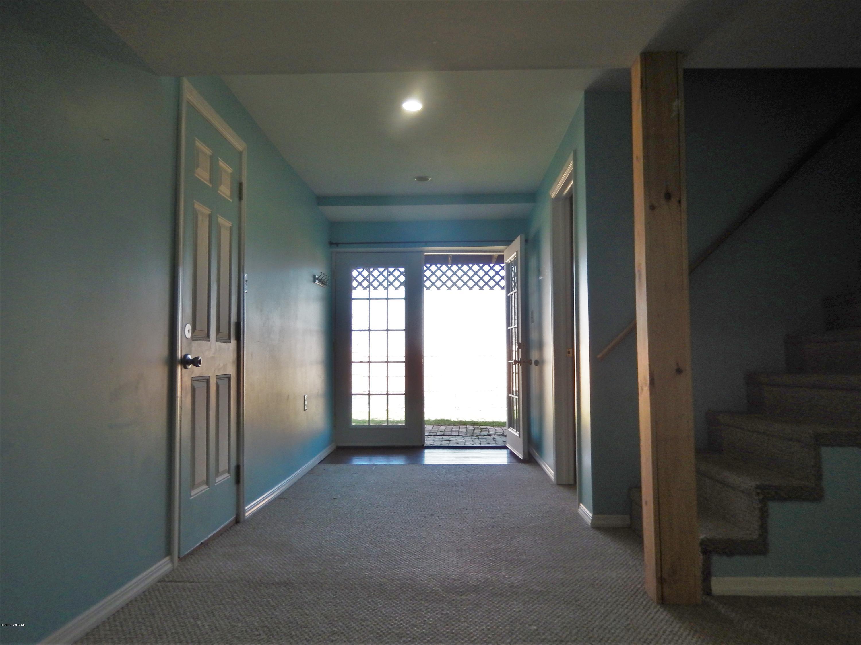 25 Old Orchard Road Milton, PA 17847 - Photo 12 of 24 Lower Living space walk-out to yard and pool