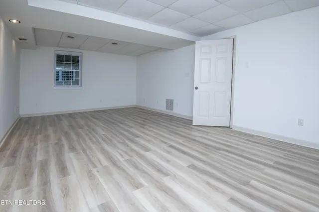 an empty room with windows