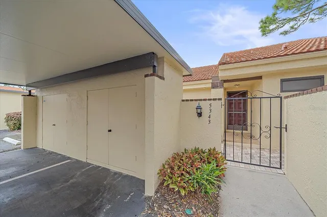 a view of a house with a potted plant