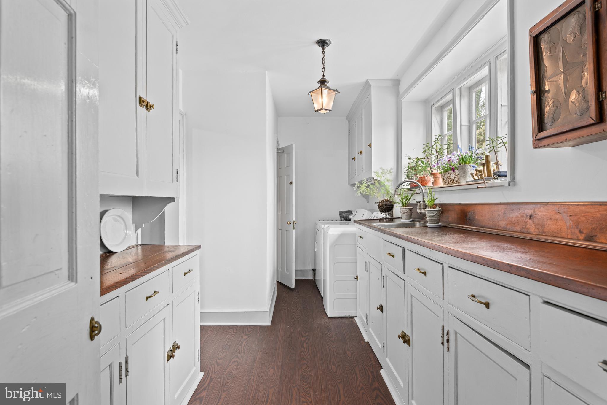 1 East Brookhaven Road Wallingford, PA 19086 - Photo 11 of 57 a spacious bathroom with a double vanity sink a mirror and a shower