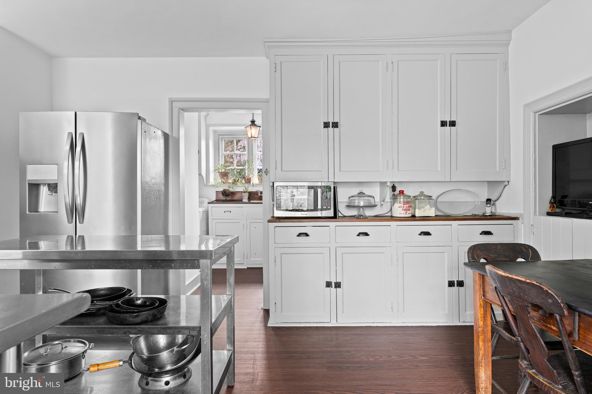 1 East Brookhaven Road Wallingford, PA 19086 - Photo 16 of 57 a kitchen with stainless steel appliances a stove refrigerator sink and cabinets