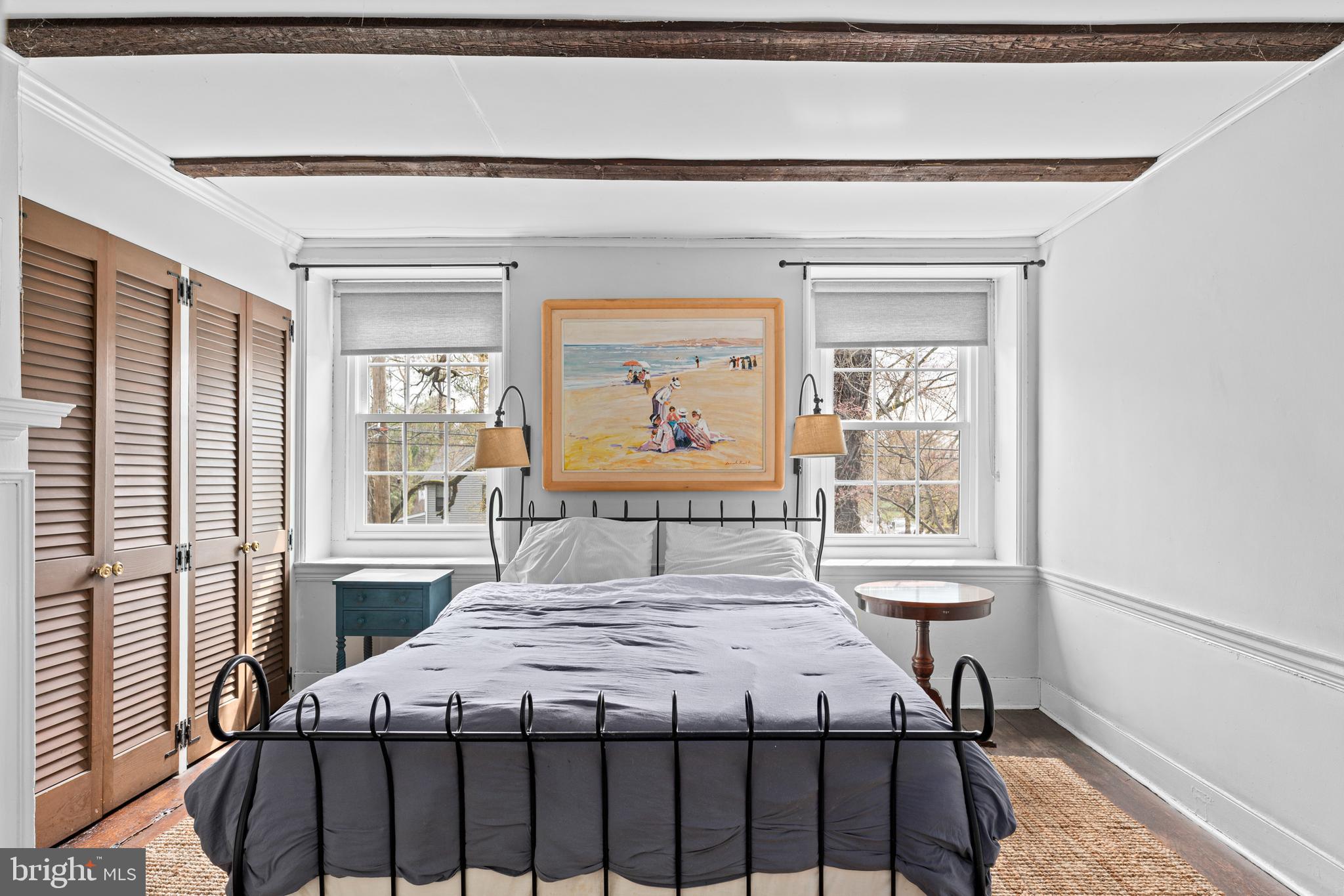 1 East Brookhaven Road Wallingford, PA 19086 - Photo 21 of 57 a bedroom with a bed and a table