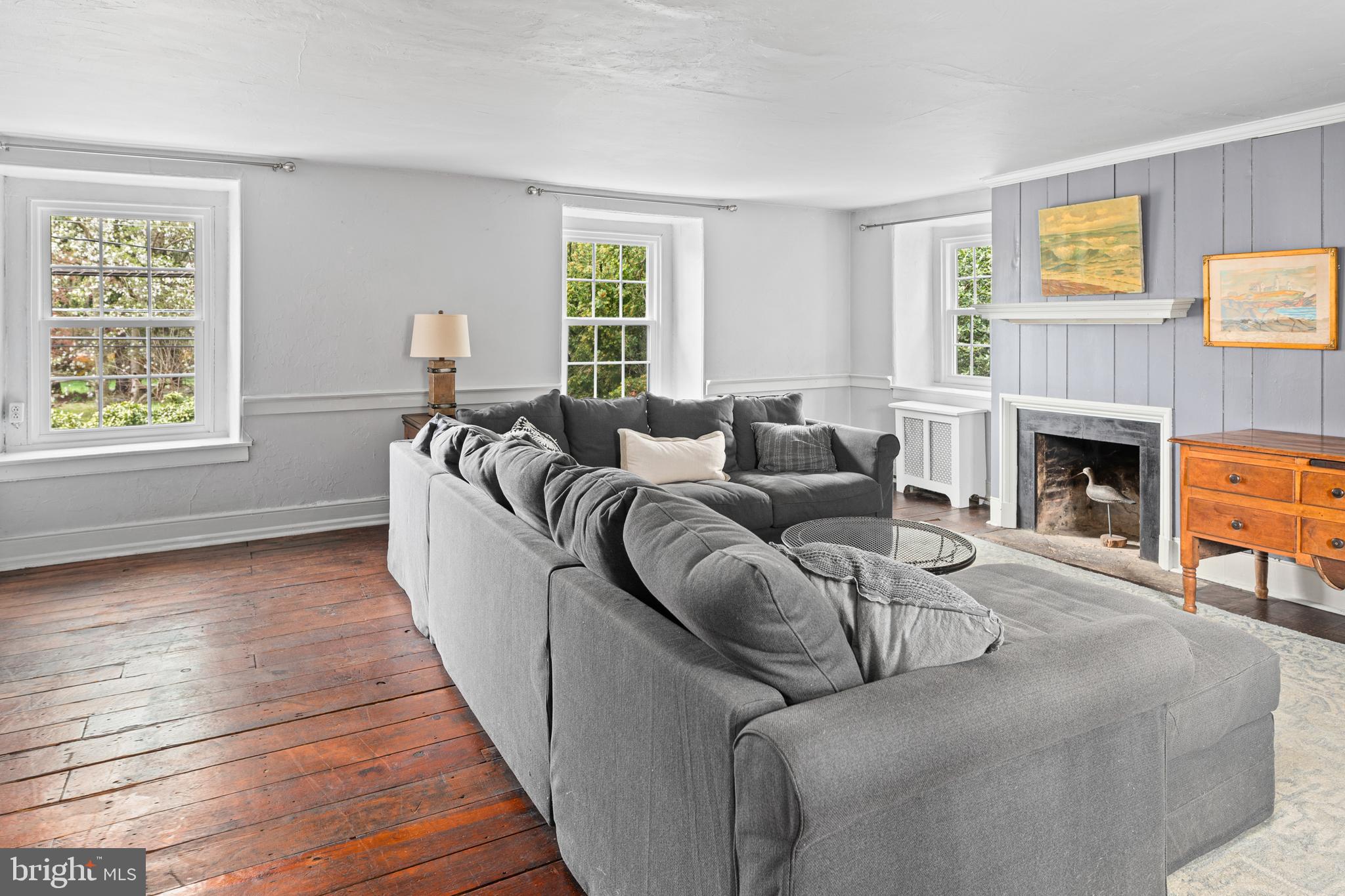1 East Brookhaven Road Wallingford, PA 19086 - Photo 28 of 57 a living room with furniture and a fireplace