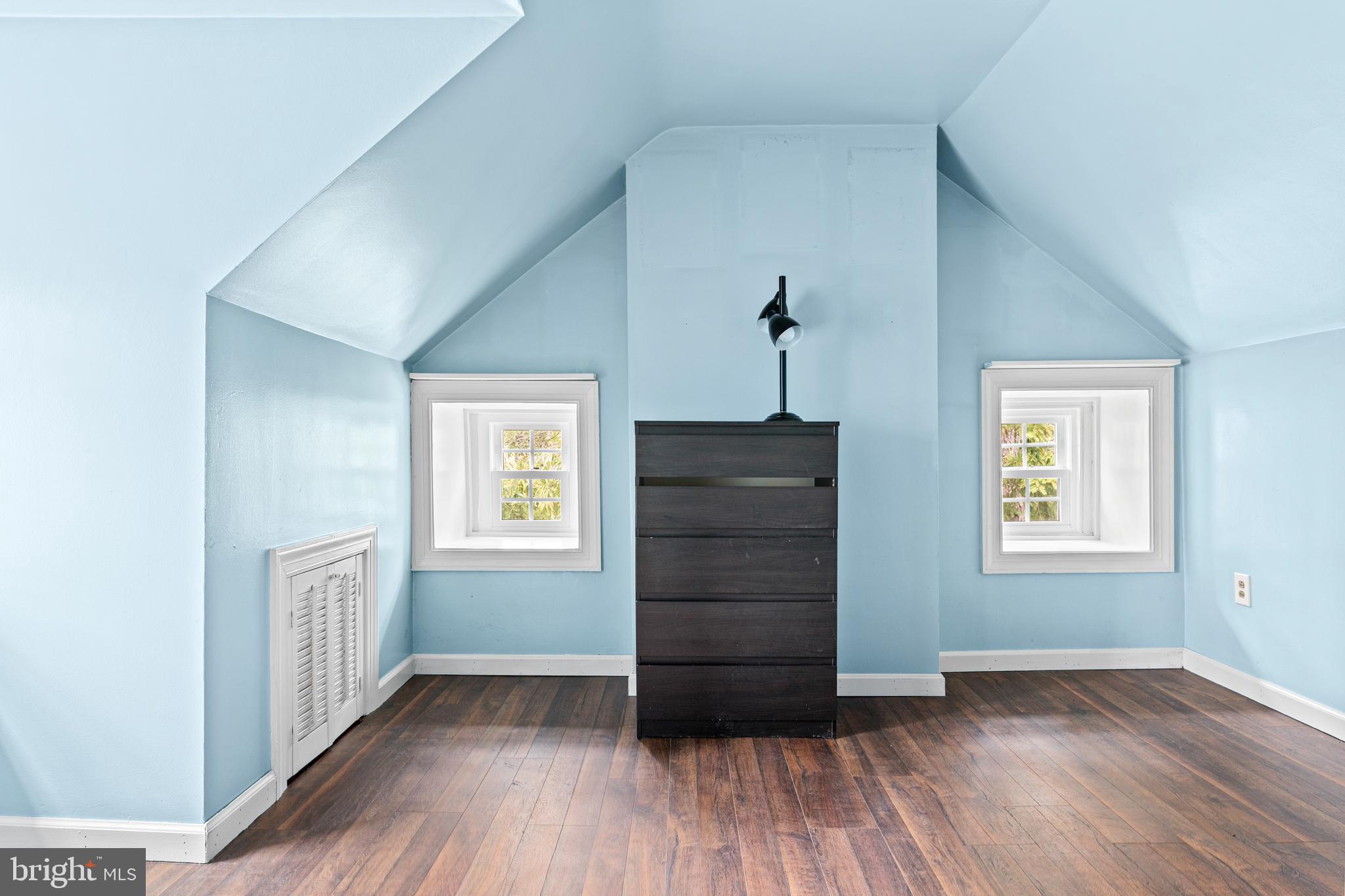 1 East Brookhaven Road Wallingford, PA 19086 - Photo 37 of 57 wooden floor in an empty room with a window