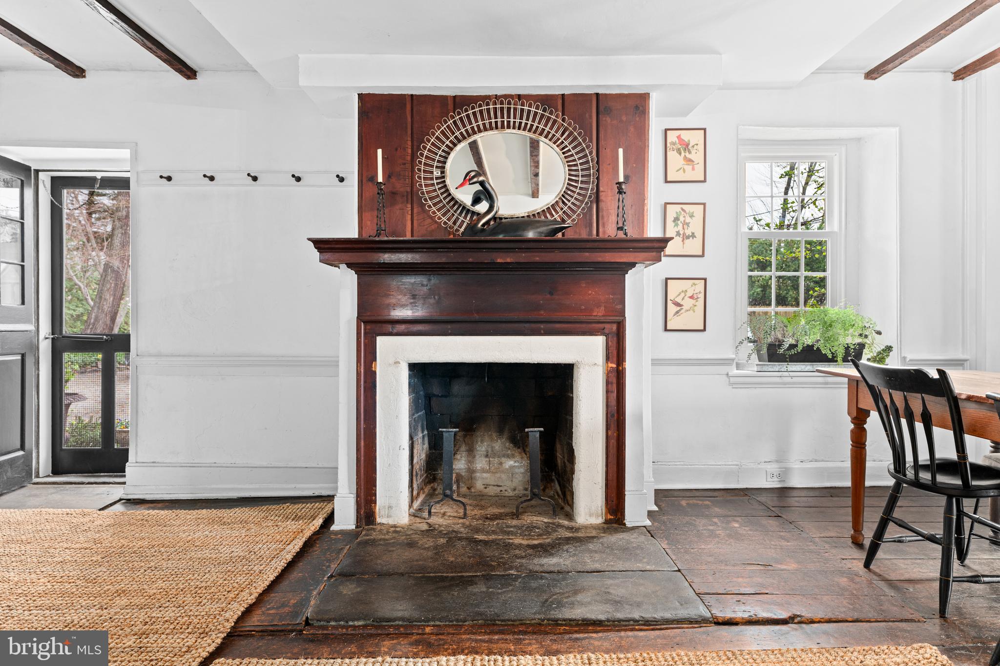 1 East Brookhaven Road Wallingford, PA 19086 - Photo 5 of 57 a living room with furniture and a fireplace