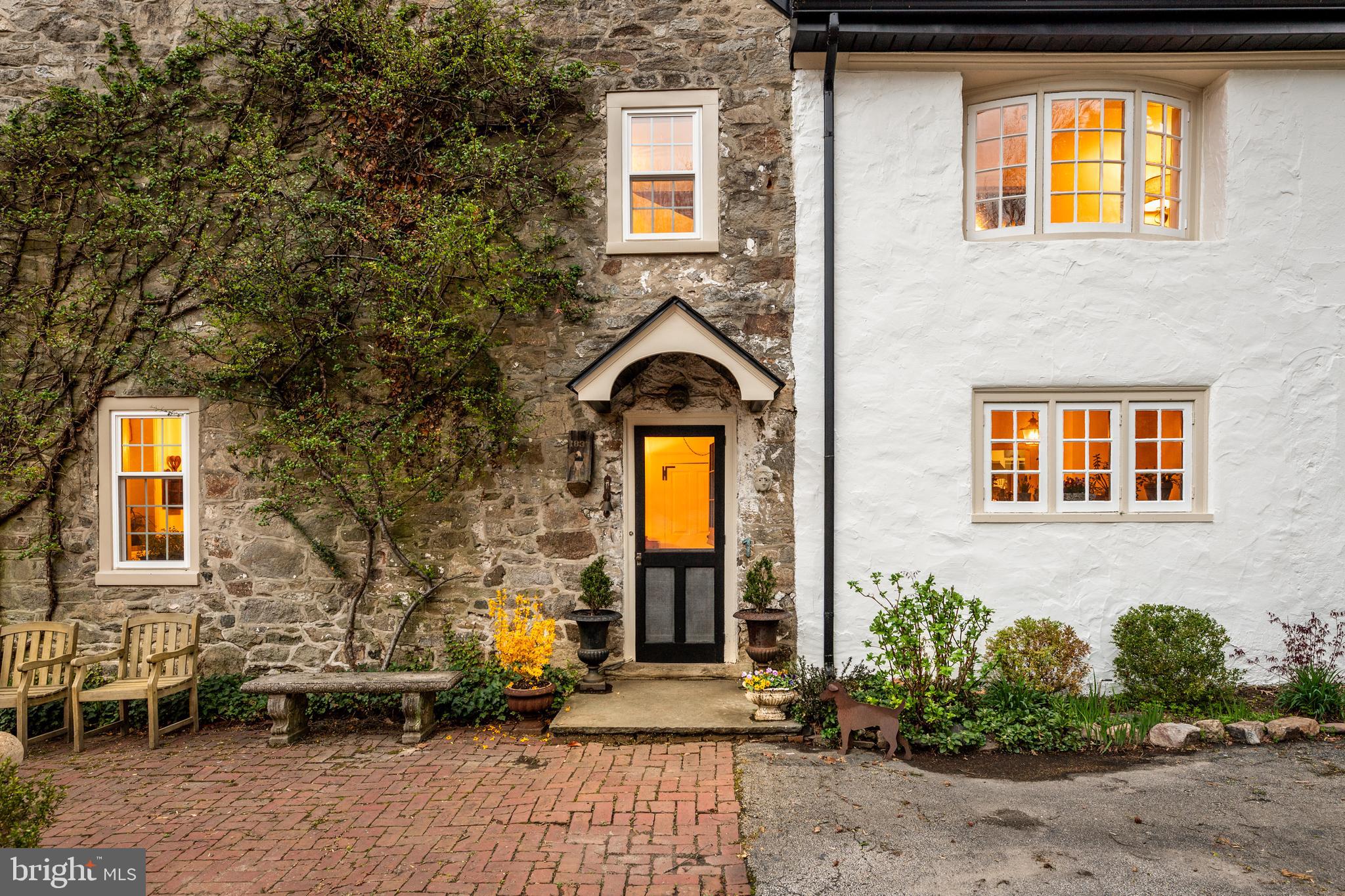 1 East Brookhaven Road Wallingford, PA 19086 - Photo 54 of 57 a front view of a house with a yard