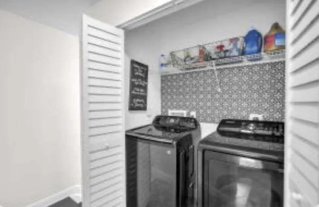 a kitchen with a stove and a cabinet