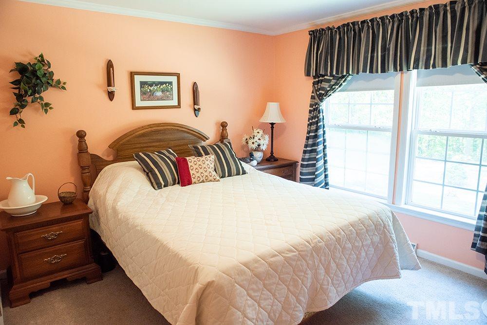 1579 Julian Oakley Road Rougemont, NC 27572 - Photo 10 of 15 a bedroom with bed and wooden floor