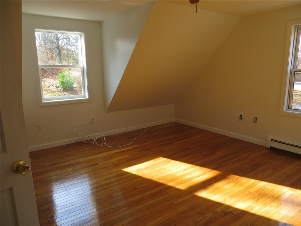 83 Columbia Heights Road Charlestown, RI 02813 - Photo 12 of 26 Second bedroom on 2nd floor looking from hallway.