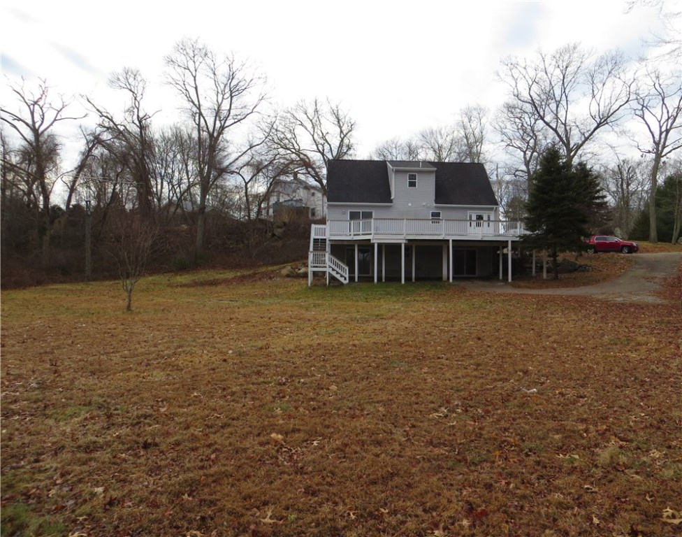 83 Columbia Heights Road Charlestown, RI 02813 - Photo 20 of 26 Looking from backyard towards house.