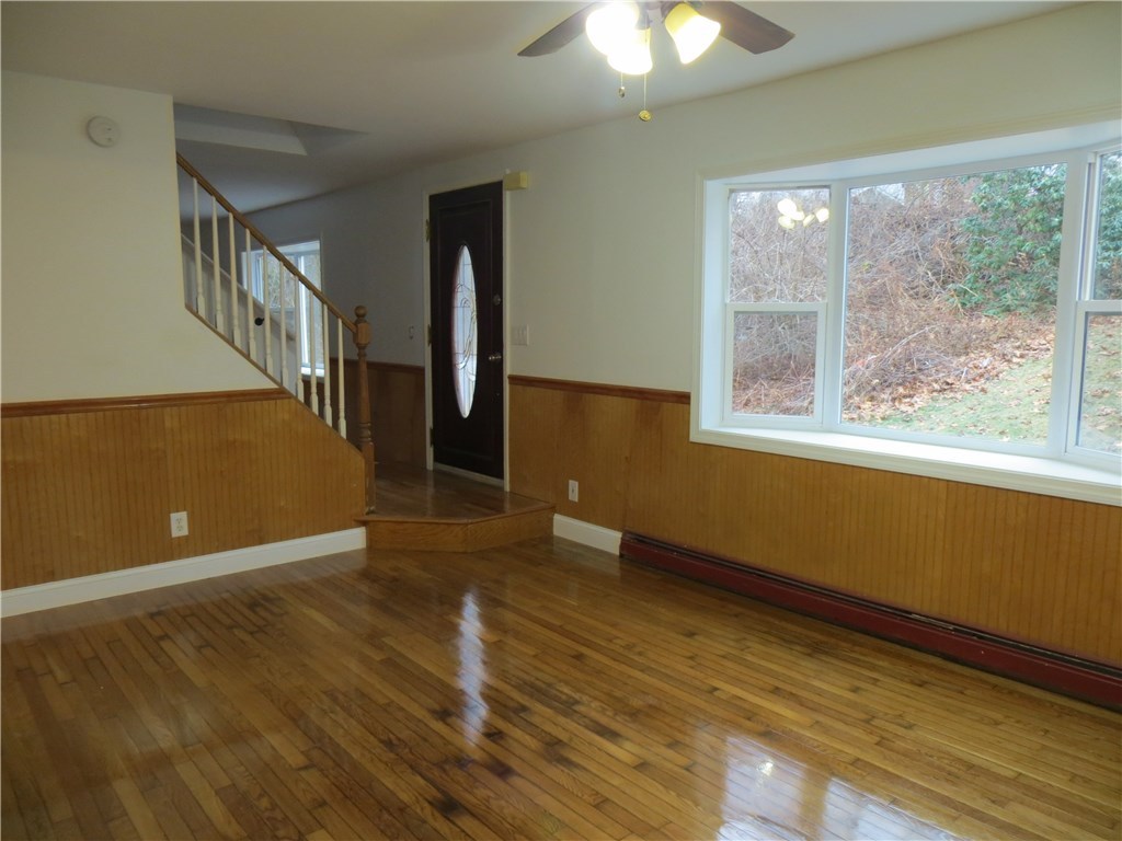 83 Columbia Heights Road Charlestown, RI 02813 - Photo 3 of 26 Dining Room looking towards living room.