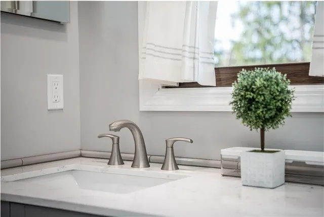 a view of house with backyard