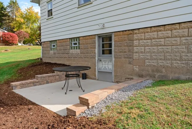 a view of a field with an trees