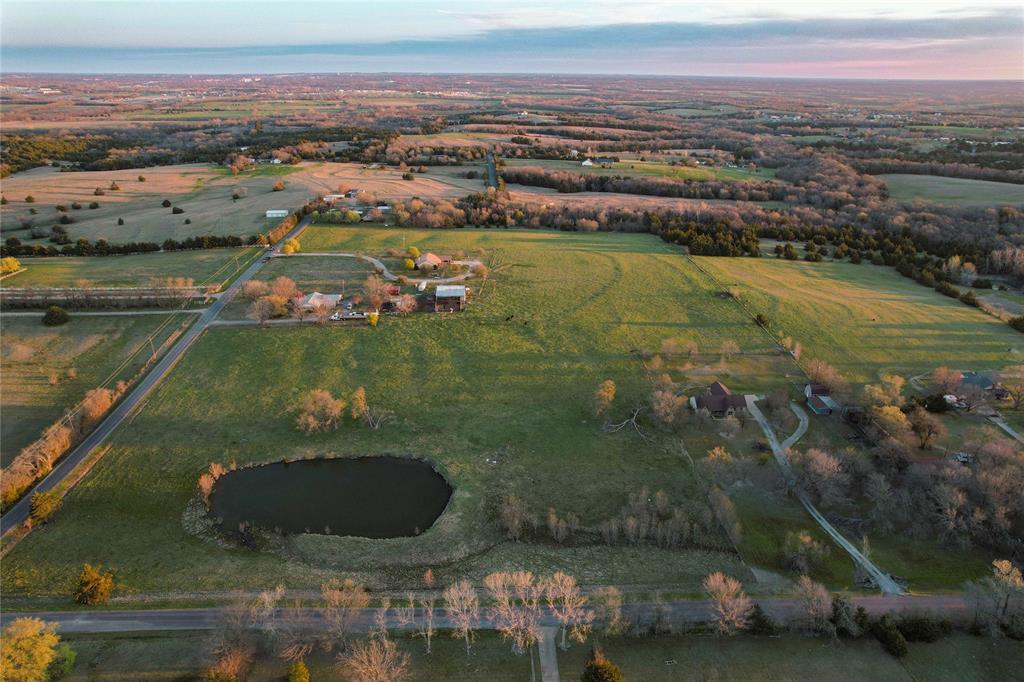 992 Bennett Road Howe, TX 75459 - Photo 11 of 26 an aerial view of residential houses with outdoor space