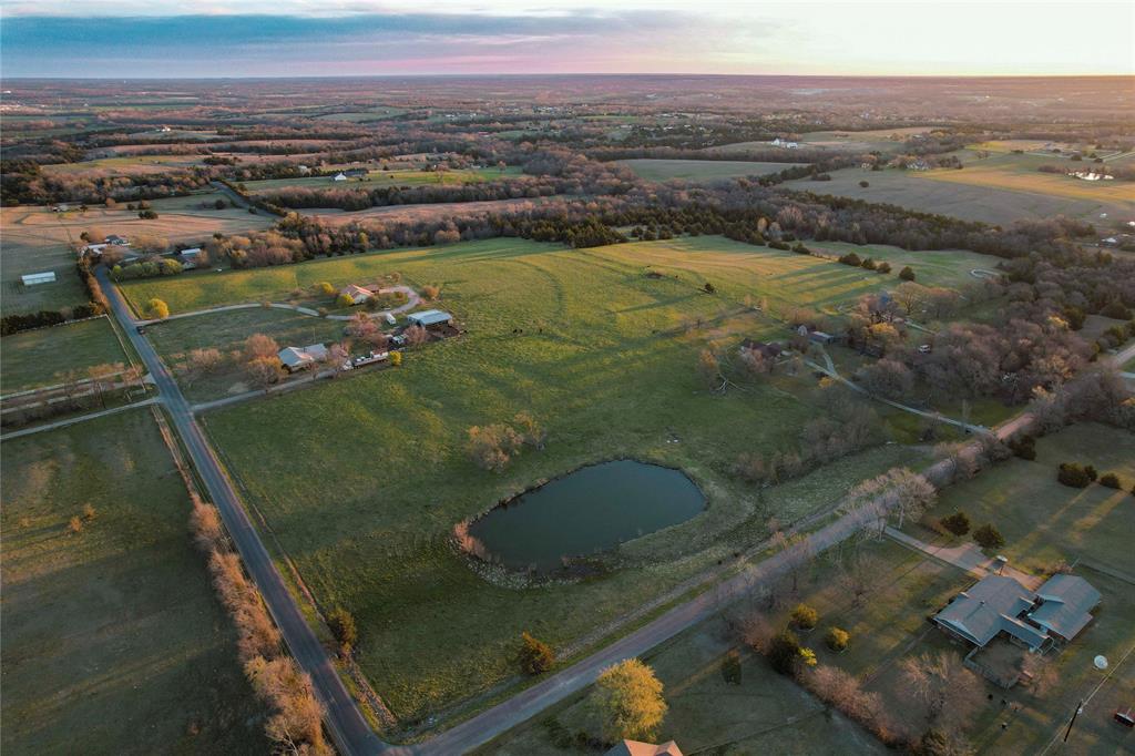 992 Bennett Road Howe, TX 75459 - Photo 12 of 26 a view of a lake in middle of the town