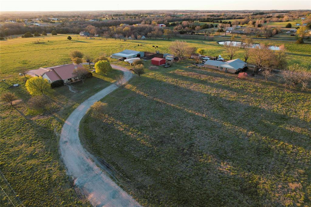 992 Bennett Road Howe, TX 75459 - Photo 18 of 26 a view of a lake with outdoor space