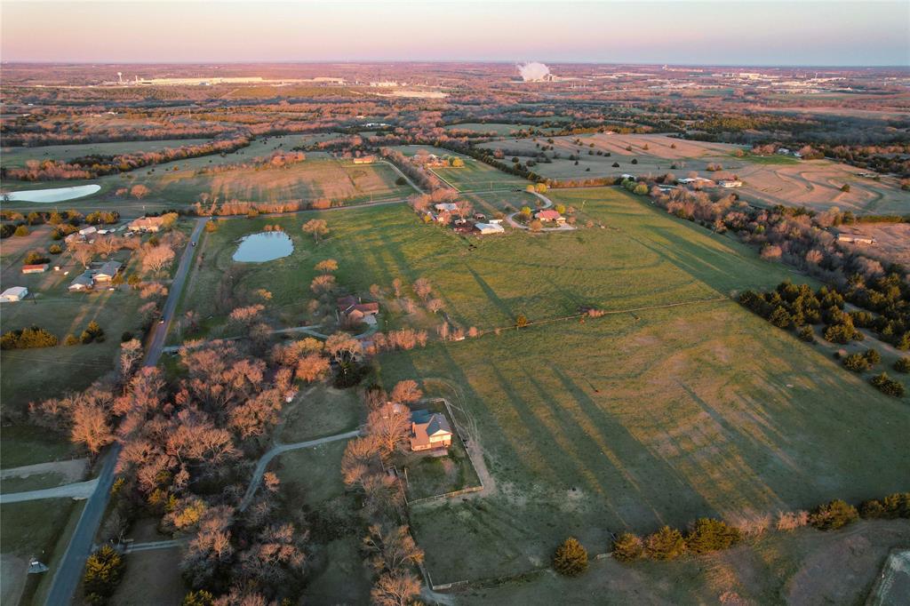 992 Bennett Road Howe, TX 75459 - Photo 5 of 26 an aerial view of lake and residential houses with outdoor space