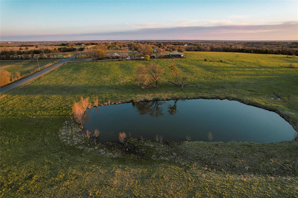 992 Bennett Road Howe, TX 75459 - Photo 6 of 26 an aerial view of residential houses with outdoor space