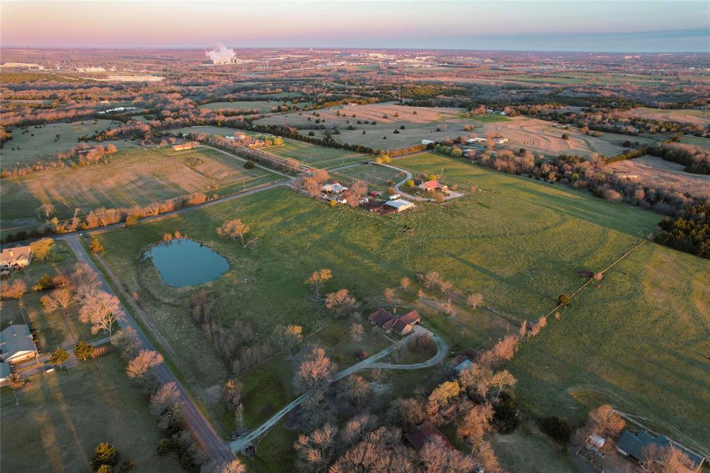 992 Bennett Road Howe, TX 75459 - Photo 7 of 26 an aerial view of residential houses with outdoor space