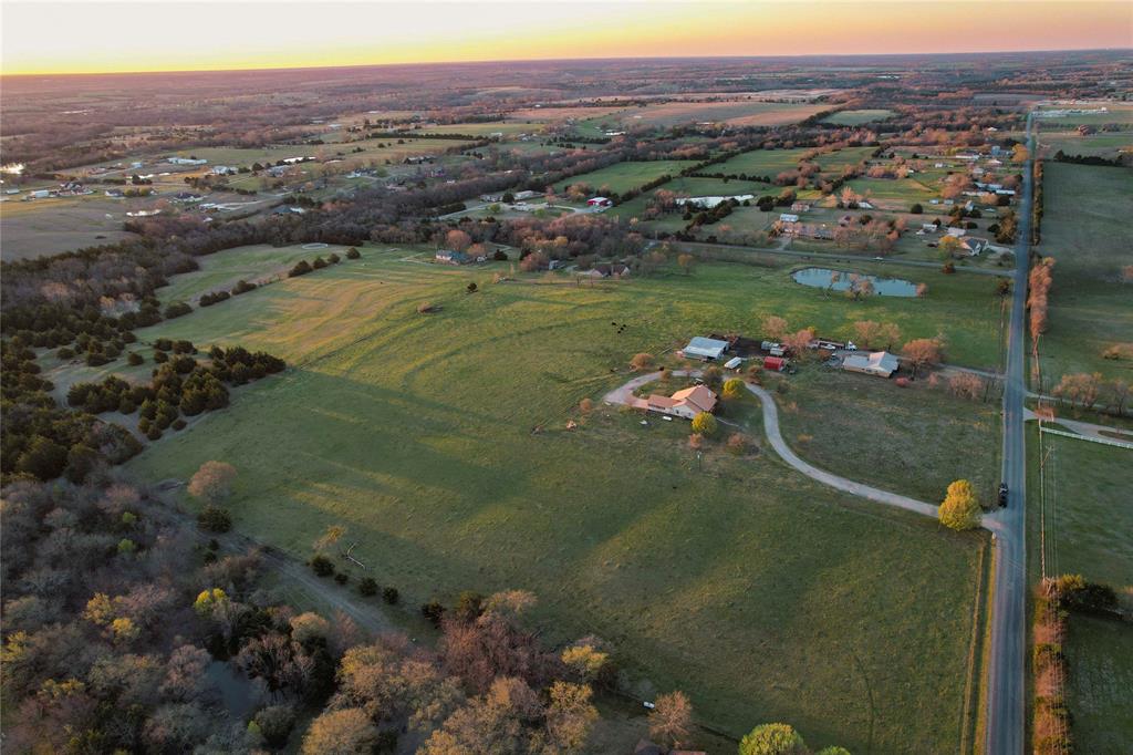 992 Bennett Road Howe, TX 75459 - Photo 8 of 26 a view of a lake in middle of the town