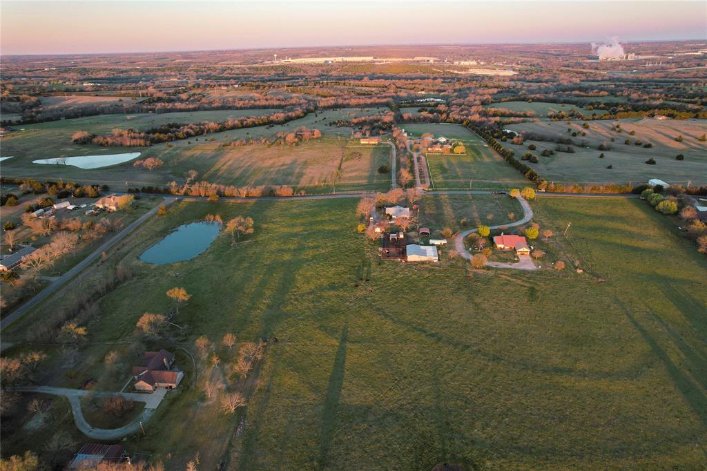 992 Bennett Road Howe, TX 75459 - Photo 9 of 26 an aerial view of lake and residential houses with outdoor space