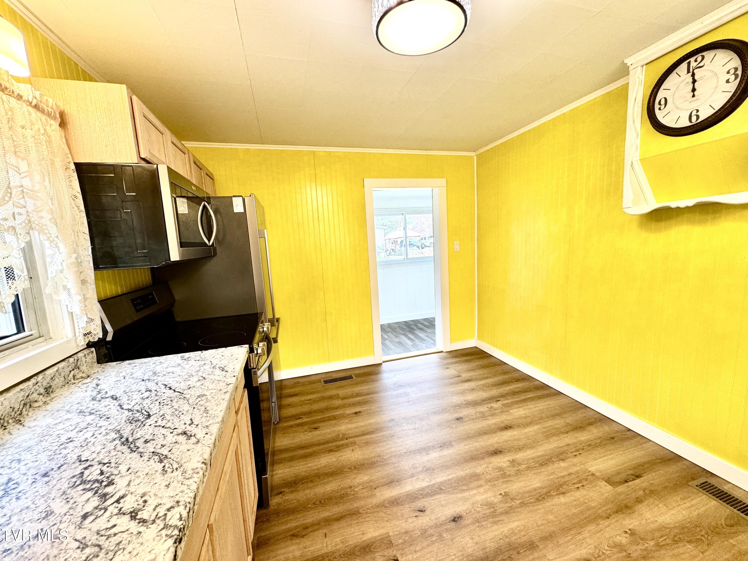 2342 Roda Road Appalachia, VA 24216 - Photo 20 of 30 EMPTY KITCHEN VIEW TOWARD HALLWAY