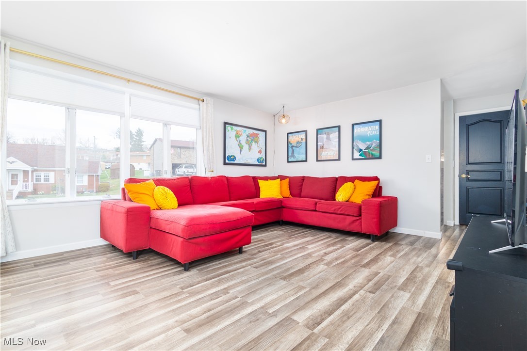137 Preston Road Steubenville, OH 43953 - Photo 22 of 38 Living room with baseboards and wood finished floors
