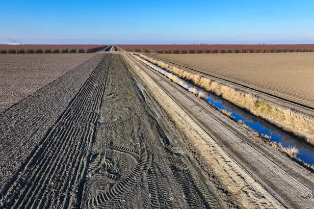 a view of a balcony with wooden floor