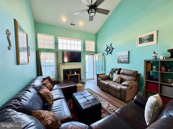 a living room with furniture or couch and a rug